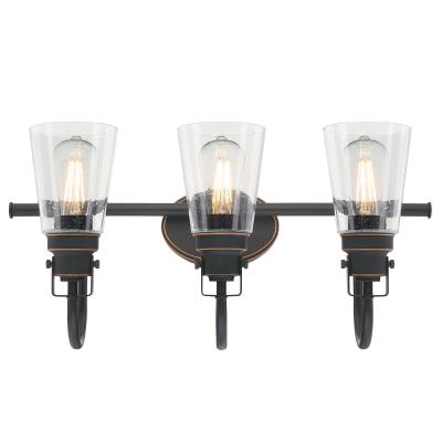 Westinghouse 6574700 Three Light Wall Fixture - Oil Rubbed Bronze Finish with Highlights Clear Seeded Glass