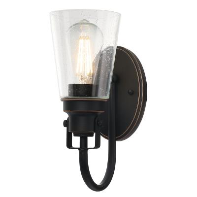Westinghouse 6574500 One Light Wall Fixture - Oil Rubbed Bronze Finish with Highlights - Clear Seeded Glass